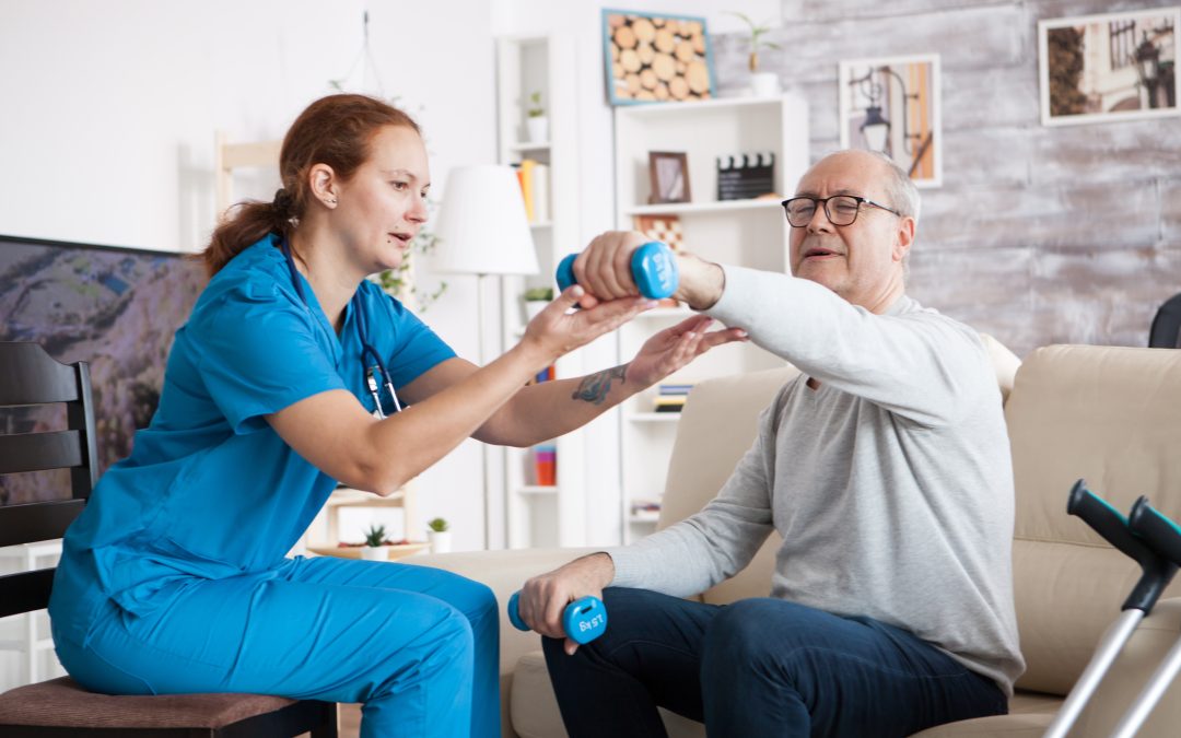 Physiotherapist assisting an elderly person with balance exercises